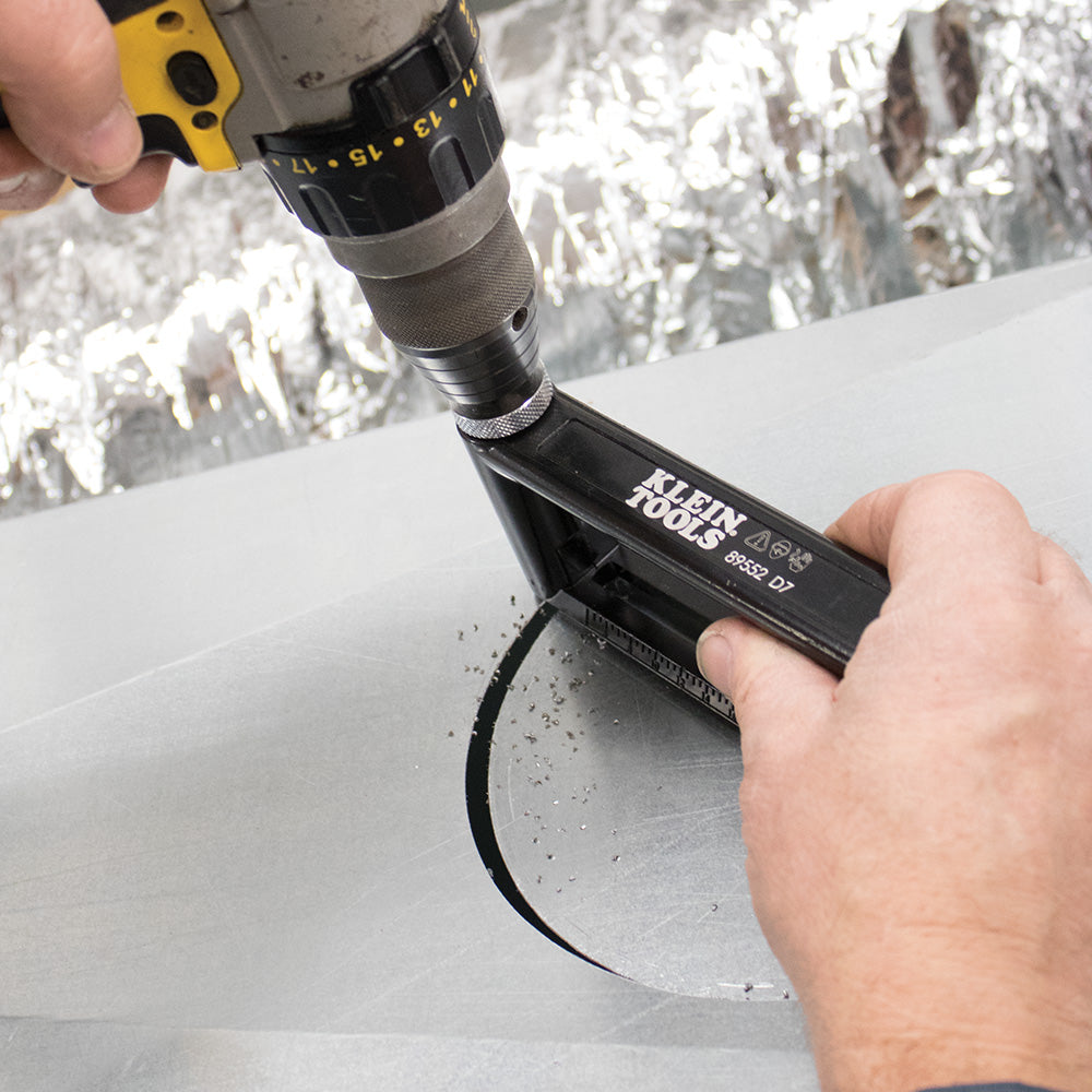 Klein Tools 89552 Hole Cutter for Duct and Sheet Metal, 2 to 12-Inch - in use