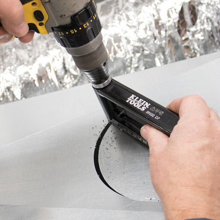 Klein Tools 89552 Hole Cutter for Duct and Sheet Metal, 2 to 12-Inch - in use